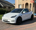 Белый Тесла Model Y, объемом двигателя 0 л и пробегом 97 тыс. км за 23000 $, фото 1 на Automoto.ua