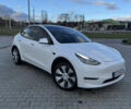 Білий Тесла Model Y, об'ємом двигуна 0 л та пробігом 83 тис. км за 24500 $, фото 1 на Automoto.ua