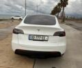 Белый Тесла Model Y, объемом двигателя 0 л и пробегом 58 тыс. км за 23000 $, фото 1 на Automoto.ua