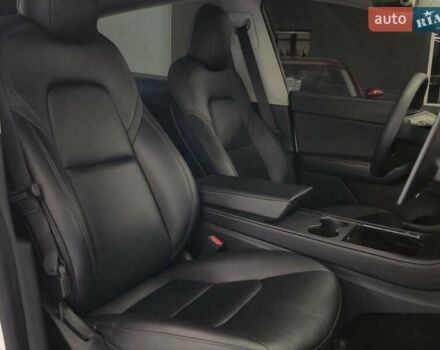 Білий Тесла Model Y, об'ємом двигуна 0 л та пробігом 58 тис. км за 26989 $, фото 15 на Automoto.ua