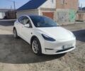 Белый Тесла Model Y, объемом двигателя 0 л и пробегом 73 тыс. км за 23000 $, фото 1 на Automoto.ua