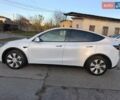 Білий Тесла Model Y, об'ємом двигуна 0 л та пробігом 86 тис. км за 25300 $, фото 1 на Automoto.ua