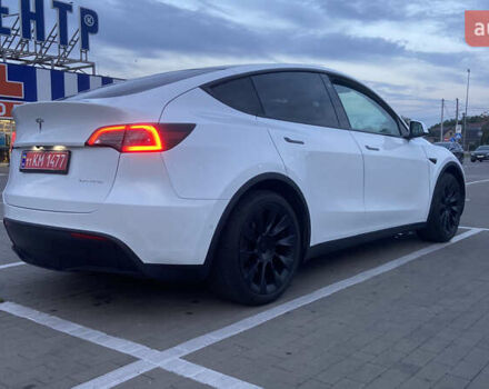 Белый Тесла Model Y, объемом двигателя 0 л и пробегом 81 тыс. км за 25000 $, фото 3 на Automoto.ua