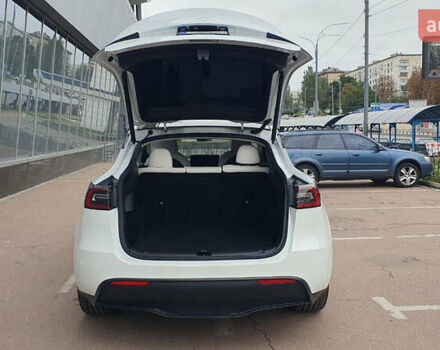 Білий Тесла Model Y, об'ємом двигуна 0 л та пробігом 74 тис. км за 25900 $, фото 21 на Automoto.ua