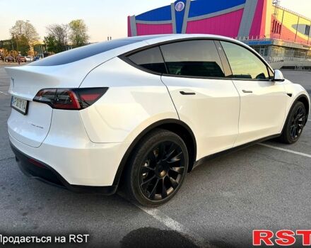 Білий Тесла Model Y, об'ємом двигуна 0 л та пробігом 65 тис. км за 27999 $, фото 2 на Automoto.ua