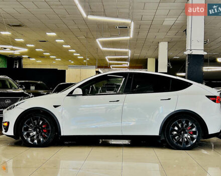 Білий Тесла Model Y, об'ємом двигуна 0 л та пробігом 74 тис. км за 24979 $, фото 7 на Automoto.ua