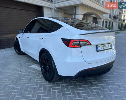 Белый Тесла Model Y, объемом двигателя 0 л и пробегом 101 тыс. км за 18800 $, фото 5 на Automoto.ua