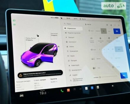 Білий Тесла Model Y, об'ємом двигуна 0 л та пробігом 33 тис. км за 39999 $, фото 28 на Automoto.ua