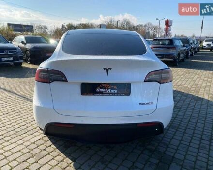 Білий Тесла Model Y, об'ємом двигуна 0 л та пробігом 54 тис. км за 21900 $, фото 5 на Automoto.ua