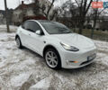 Белый Тесла Model Y, объемом двигателя 0 л и пробегом 50 тыс. км за 28999 $, фото 1 на Automoto.ua