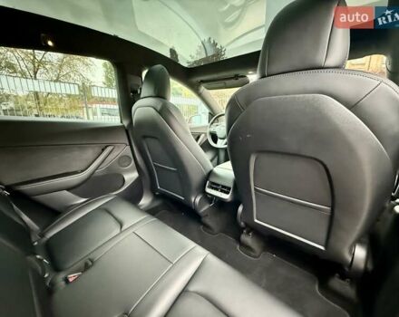 Белый Тесла Model Y, объемом двигателя 0 л и пробегом 88 тыс. км за 26999 $, фото 22 на Automoto.ua