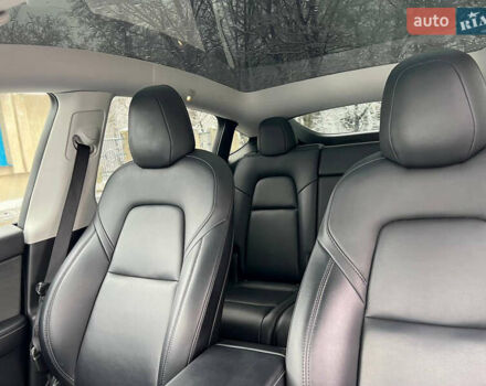 Білий Тесла Model Y, об'ємом двигуна 0 л та пробігом 88 тис. км за 24900 $, фото 39 на Automoto.ua