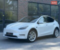 Белый Тесла Model Y, объемом двигателя 0 л и пробегом 58 тыс. км за 23800 $, фото 1 на Automoto.ua