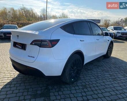 Білий Тесла Model Y, об'ємом двигуна 0 л та пробігом 54 тис. км за 21900 $, фото 6 на Automoto.ua