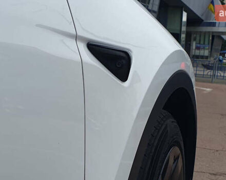 Білий Тесла Model Y, об'ємом двигуна 0 л та пробігом 74 тис. км за 25900 $, фото 27 на Automoto.ua
