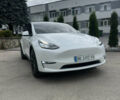 Белый Тесла Model Y, объемом двигателя 0 л и пробегом 128 тыс. км за 24999 $, фото 1 на Automoto.ua