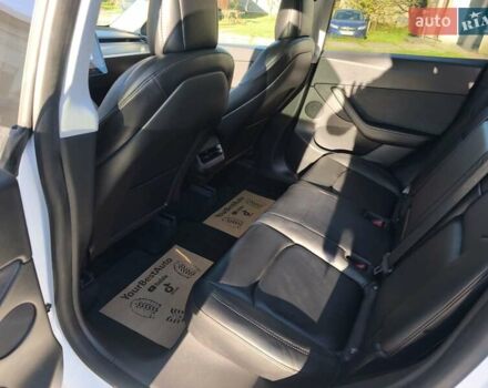 Білий Тесла Model Y, об'ємом двигуна 0 л та пробігом 86 тис. км за 25300 $, фото 17 на Automoto.ua