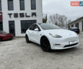 Белый Тесла Model Y, объемом двигателя 0 л и пробегом 77 тыс. км за 24200 $, фото 3 на Automoto.ua