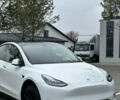 Белый Тесла Model Y, объемом двигателя 0 л и пробегом 79 тыс. км за 25500 $, фото 1 на Automoto.ua