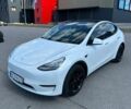 Белый Тесла Model Y, объемом двигателя 0 л и пробегом 179 тыс. км за 22999 $, фото 1 на Automoto.ua