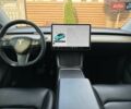 Білий Тесла Model Y, об'ємом двигуна 0 л та пробігом 79 тис. км за 24700 $, фото 73 на Automoto.ua