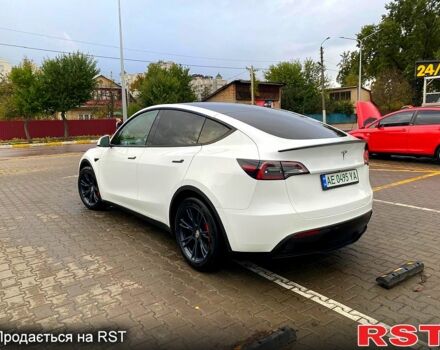Тесла Model Y 2021 в Ирпене на Automoto.ua Белый Тесла Model Y, объемом двигателя 0 л и пробегом 80 тыс. км за 26700 $, фото 4 на Automoto.ua