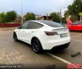 Тесла Model Y 2021 в Ирпене на Automoto.ua Белый Тесла Model Y, объемом двигателя 0 л и пробегом 80 тыс. км за 26700 $, фото 4 на Automoto.ua