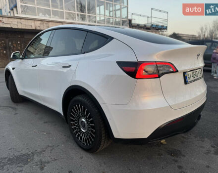Білий Тесла Model Y, об'ємом двигуна 0 л та пробігом 55 тис. км за 24990 $, фото 2 на Automoto.ua