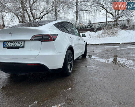 Білий Тесла Model Y, об'ємом двигуна 0 л та пробігом 88 тис. км за 24900 $, фото 1 на Automoto.ua