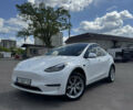 Белый Тесла Model Y, объемом двигателя 0 л и пробегом 55 тыс. км за 24900 $, фото 1 на Automoto.ua
