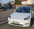 Білий Тесла Model Y, об'ємом двигуна 0 л та пробігом 101 тис. км за 23899 $, фото 1 на Automoto.ua
