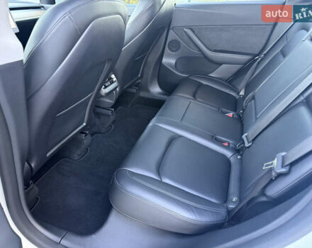 Тесла Model Y 2021 в Хмельницком на Automoto.ua Белый Тесла Model Y, объемом двигателя 0 л и пробегом 83 тыс. км за 25499 $, фото 53 на Automoto.ua