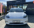 Белый Тесла Model Y, объемом двигателя 0 л и пробегом 88 тыс. км за 25700 $, фото 1 на Automoto.ua