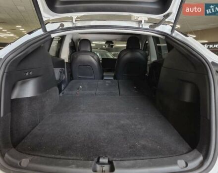 Білий Тесла Model Y, об'ємом двигуна 0 л та пробігом 58 тис. км за 26989 $, фото 12 на Automoto.ua