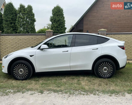 Білий Тесла Model Y, об'ємом двигуна 0 л та пробігом 54 тис. км за 23900 $, фото 16 на Automoto.ua