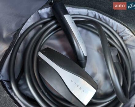 Білий Тесла Model Y, об'ємом двигуна 0 л та пробігом 86 тис. км за 25300 $, фото 21 на Automoto.ua