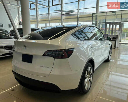 Белый Тесла Model Y, объемом двигателя 0 л и пробегом 101 тыс. км за 21500 $, фото 5 на Automoto.ua