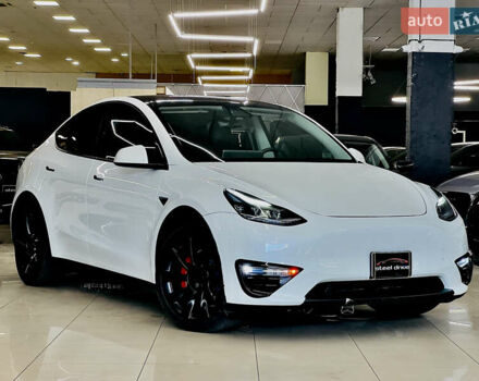 Білий Тесла Model Y, об'ємом двигуна 0 л та пробігом 74 тис. км за 24979 $, фото 2 на Automoto.ua