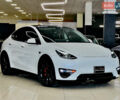 Білий Тесла Model Y, об'ємом двигуна 0 л та пробігом 74 тис. км за 24979 $, фото 2 на Automoto.ua