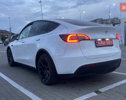 Белый Тесла Model Y, объемом двигателя 0 л и пробегом 81 тыс. км за 25000 $, фото 2 на Automoto.ua