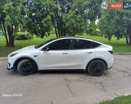 Белый Тесла Model Y, объемом двигателя 0 л и пробегом 67 тыс. км за 23000 $, фото 2 на Automoto.ua