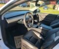 Білий Тесла Model Y, об'ємом двигуна 0 л та пробігом 86 тис. км за 25300 $, фото 10 на Automoto.ua