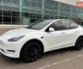 Белый Тесла Model Y, объемом двигателя 0 л и пробегом 55 тыс. км за 28900 $, фото 1 на Automoto.ua