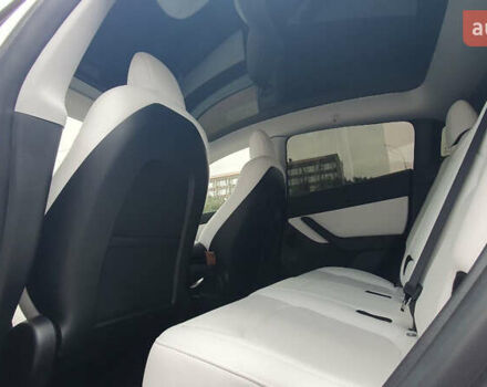 Білий Тесла Model Y, об'ємом двигуна 0 л та пробігом 74 тис. км за 25900 $, фото 15 на Automoto.ua