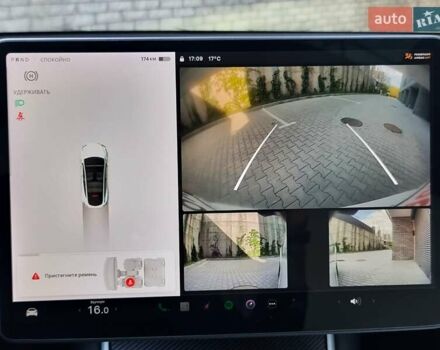 Белый Тесла Model Y, объемом двигателя 0 л и пробегом 98 тыс. км за 26499 $, фото 32 на Automoto.ua