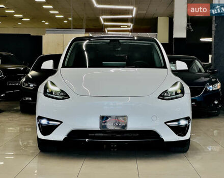 Білий Тесла Model Y, об'ємом двигуна 0 л та пробігом 74 тис. км за 24979 $, фото 1 на Automoto.ua