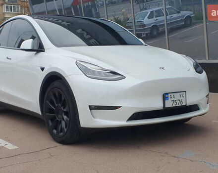 Білий Тесла Model Y, об'ємом двигуна 0 л та пробігом 74 тис. км за 25900 $, фото 1 на Automoto.ua
