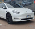 Білий Тесла Model Y, об'ємом двигуна 0 л та пробігом 74 тис. км за 25900 $, фото 1 на Automoto.ua