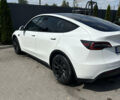 Белый Тесла Model Y, объемом двигателя 0 л и пробегом 65 тыс. км за 22800 $, фото 1 на Automoto.ua