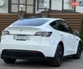Білий Тесла Model Y, об'ємом двигуна 0 л та пробігом 79 тис. км за 24700 $, фото 39 на Automoto.ua